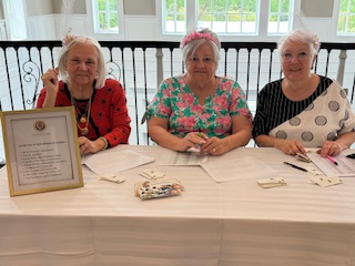 (Left to Right) Fran Parker, Sharon Shipp, and Mary Kowalewski manning the check-in table