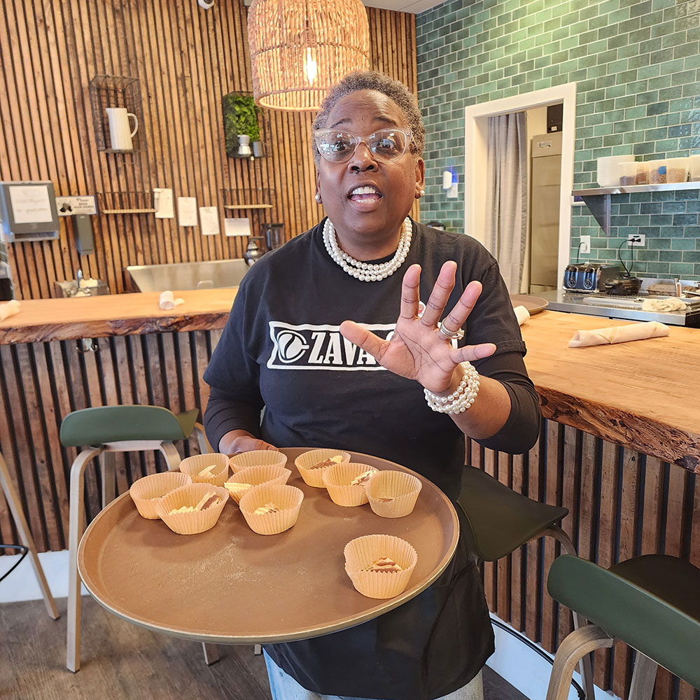 Wanda Russell brought a new level of entertainment at Zava, where she beautifully serenaded Crawlers as she passed out chocolate-covered potato chips.